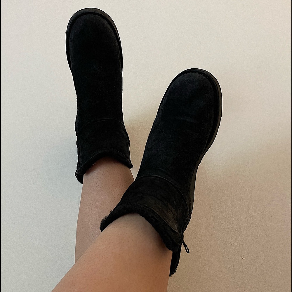 Black UGG boots, short, with gold zippers, size 9.